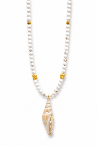 Pearl necklace with a shell pendant on a white background