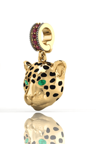 Gold panther charm with gemstone clasp designed in Florence in collaboration with Helena Christensen
