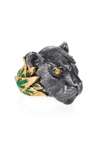 Decorative wall hook shaped like a panther head with green leaves on a white background