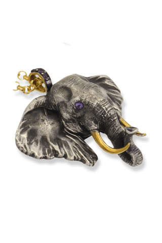 Silver elephant pendant necklace on gold chain by Amanda Marcucci