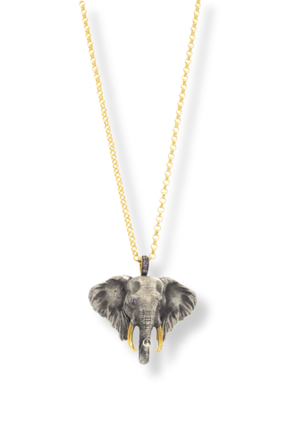 Silver elephant pendant necklace on gold chain by Amanda Marcucci